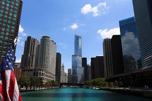 office building city with high-rise buildings viewing American flag town